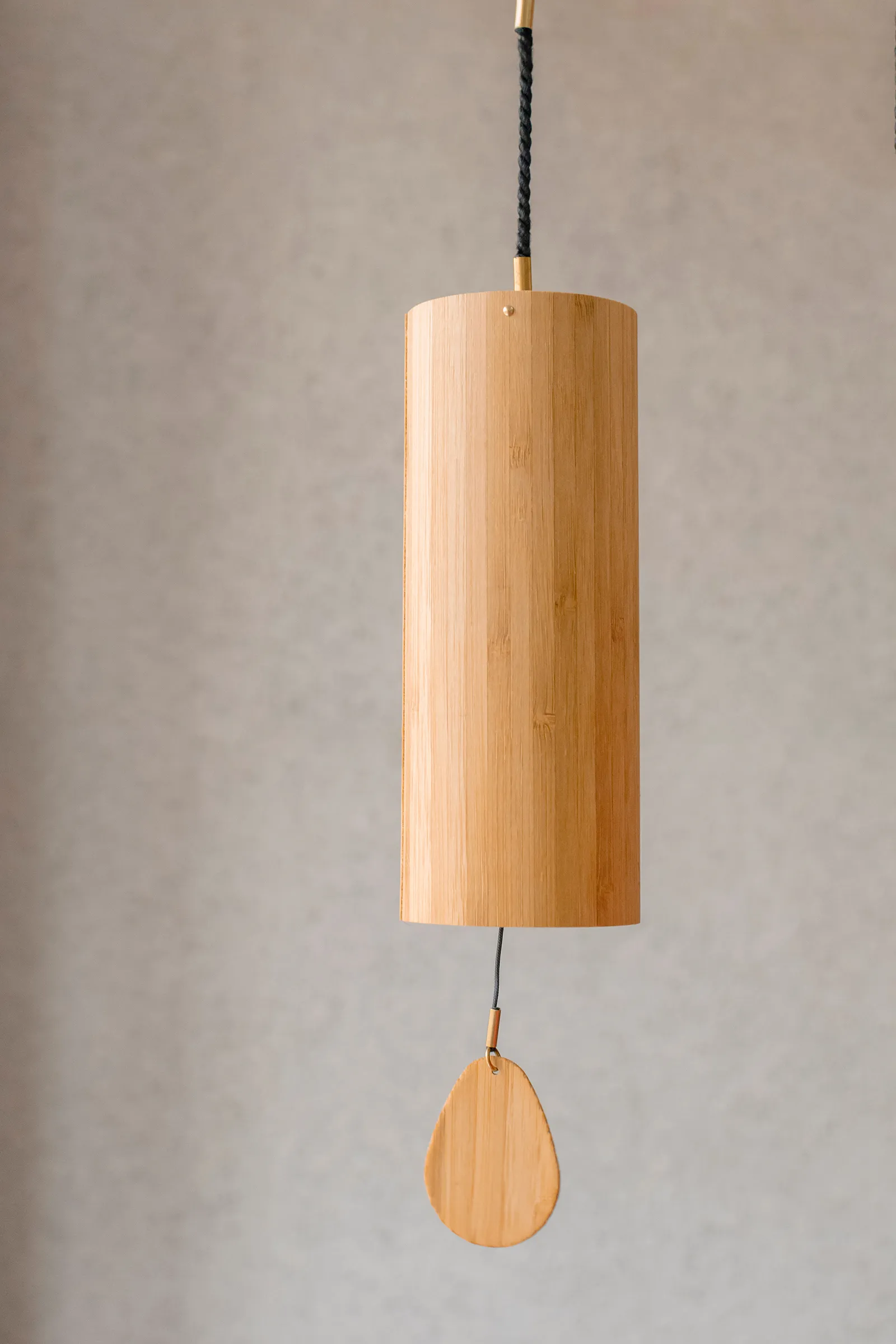 SP_26_SavvySelfCare_Main_AdobeStock_212421279_1600 A wooden wind chime hangs from the ceiling.