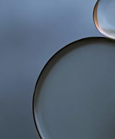 Abstract circles in clear, black, and gray colors.