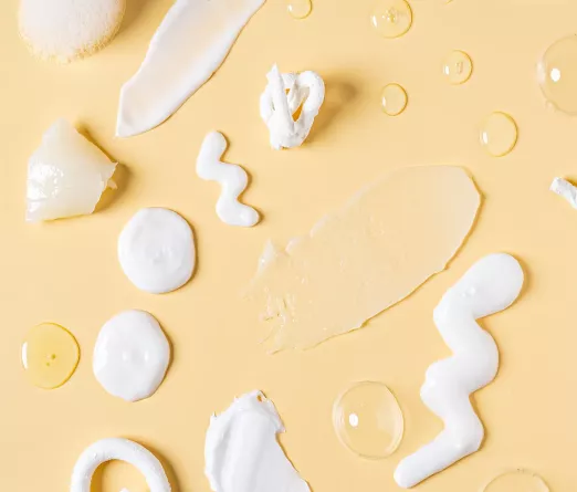 Various lotions placed on a board.