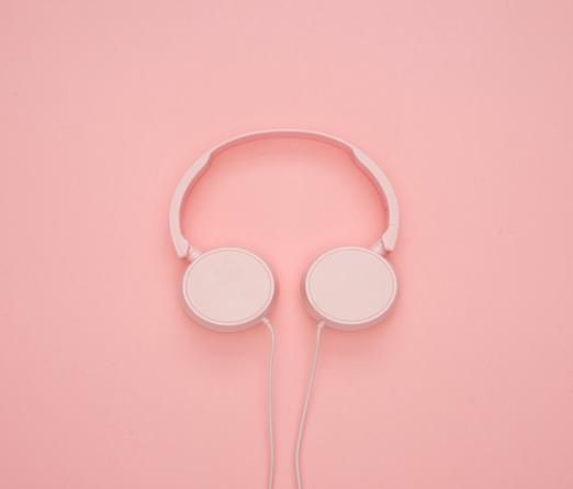 pink headphones on a pink background