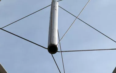 A tensegrity structure photographed from beneath.