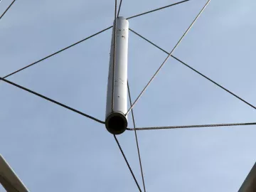 A tensegrity structure photographed from beneath.