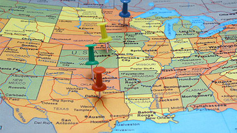 Image of a map of the US with push pins marking locations.