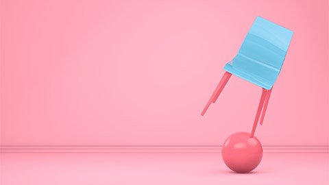 A blue chair balancing on a pink ball in a pink room.